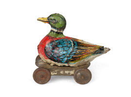 Tin lithograph duck on wheels, made by the toymaker Ananias Ananiadis, from the the 1950s