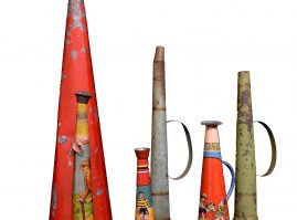 Lithographed tin trumpets of different sizes