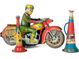 Two lithographed tin trumpets: one with children and toys (made by “EKAM” company), the other with soccer scene. In the background a zinc, hand-wound greek lithographed BMW motorbike from the 1950’s