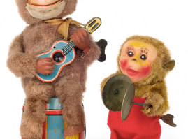 Hand-wound monkey musicians with cloth hair: the bigger sitting on a barrel with a zinc guitar is Japanese and dates in the 1950’s. The smaller, with face and shoes made of plastic, is holding cymbals and dates in the 1950’s