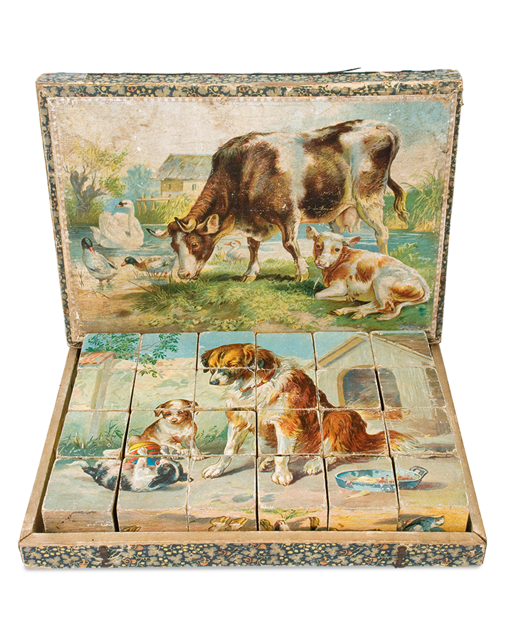 Wooden box with puzzle pieces (cube-shaped) and images from the world of animals