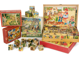 Set of boxes with puzzle pieces (cube-shaped) with different themes and pieces