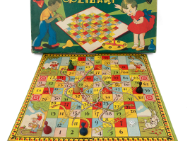 Board game “snakes and ladders” (“fidaki”) in a big rectangular carton box
