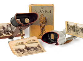 Metal stereoscope made by the American company “H.C. White Co.”, and wooden stereoscope made by the American company “Keystone view”. Cardboard stereoscope cards dating back to the early 20th century and collector’s edition of Les Misérables, written by Victor Hugo, published by Atlantis