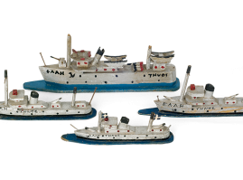Composition of four folk-themed wooden military ships with metal elements. These are different versions of the Greek warship “Elli”,  sunk by torpedo while anchored on the island of Tinos, in the summer of 1940