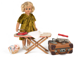Italian doll made of composition material, pictured whilst ironing, from the 1950s