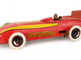 Tin lithograph wind up race-car with driver, of English origin. It dates back to the 1950s