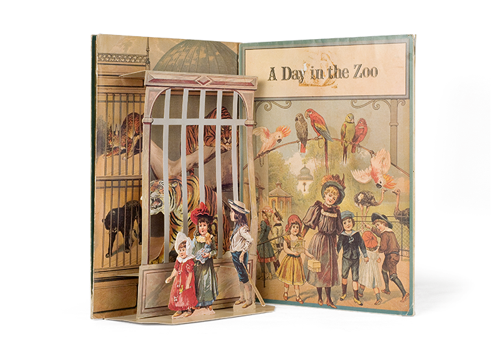 «A Day in the Zoo»: πτυσσόμενο αγγλικό παιχνιδοβιβλίο, λιθόγραφο, με έξι χαρτονένιες αφηγηματικές εικόνες που ανοίγουν σαν ακορντεόν, απαρτίζοντας όλες μαζί, μια τρισδιάστατη πανοραμική φρίζα με στιγμιότυπα από την επίσκεψη παιδιών στο ζωολογικό κήπο
