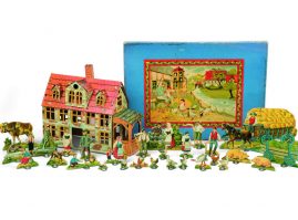German farm toy with lithograph cardboard figures in front of their box,circa 1900