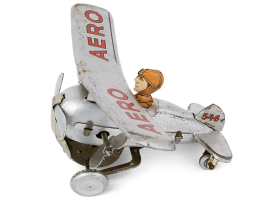 Tin wind-up lithograph propeller-driven aeroplane with a pilot, of German origin, made after 1945