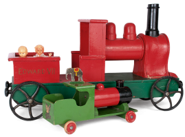 Wooden train steam engines in red, green and black colour, of English origin